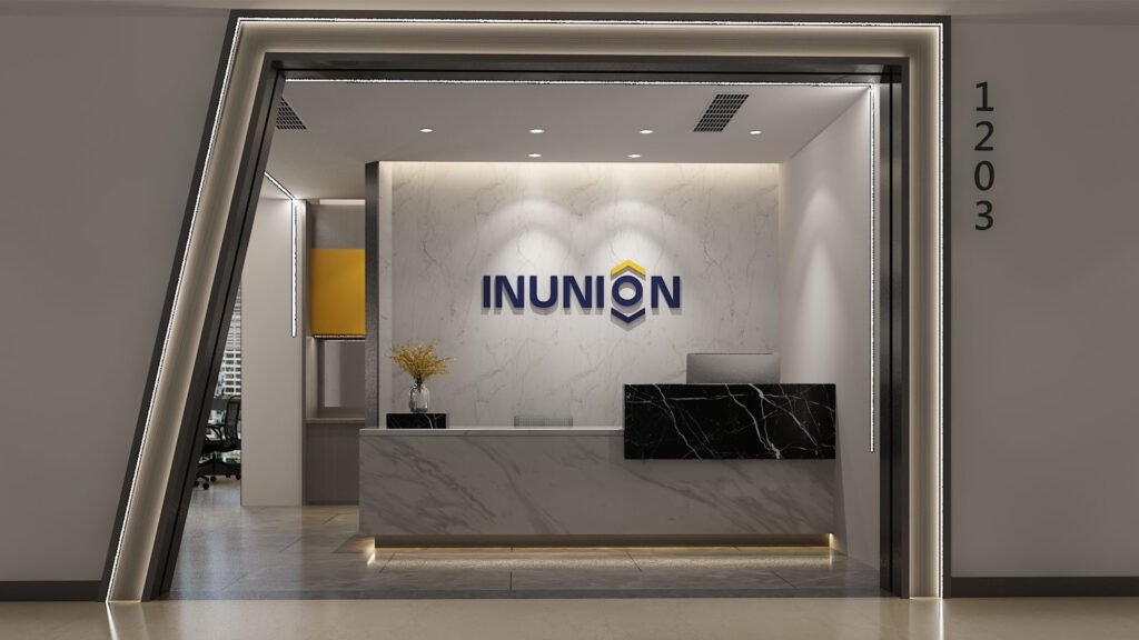 Modern office reception area with professional service team and client meeting space
